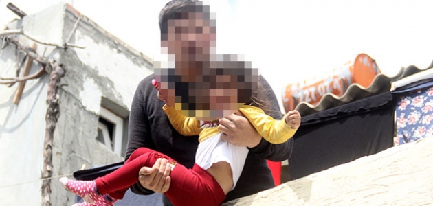 Eşiyle tartışan şahıs rehin aldığı 4 yaşındaki kızını damdan atmaya çalıştı