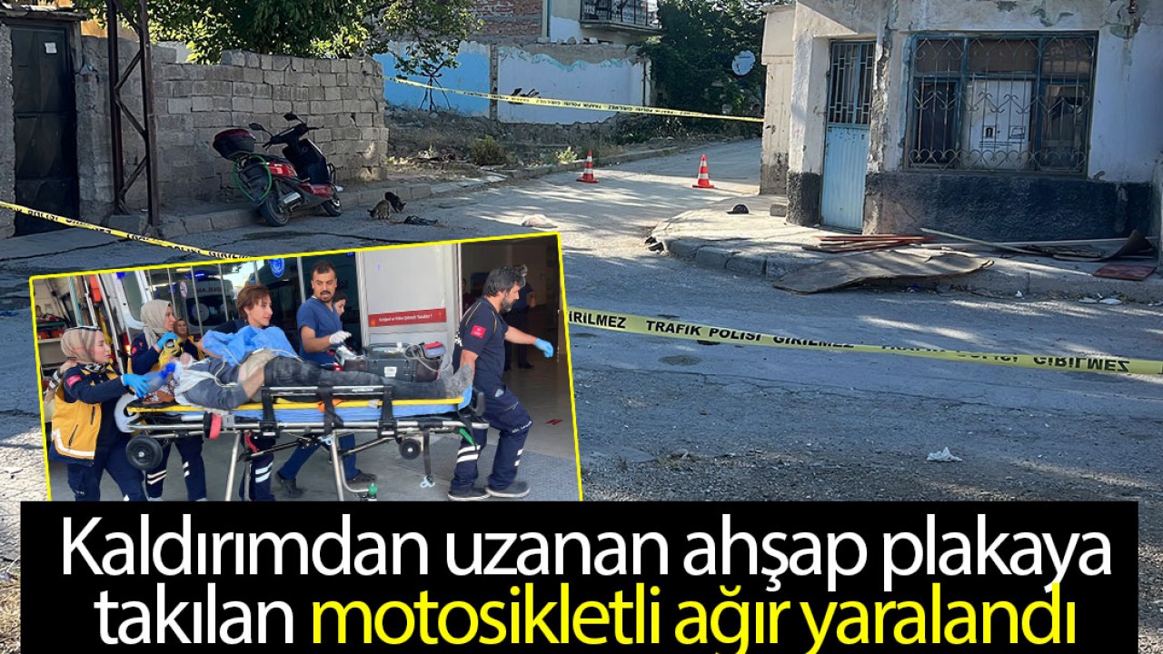 Kaldırımdan uzanan ahşap plakaya takılan motosikletli ağır yaralandı