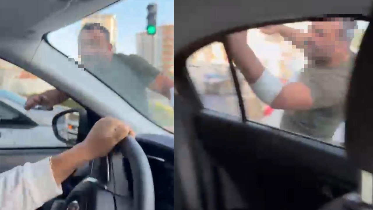 Trafikte tartıştığı kadınların otomobilini yumrukladı