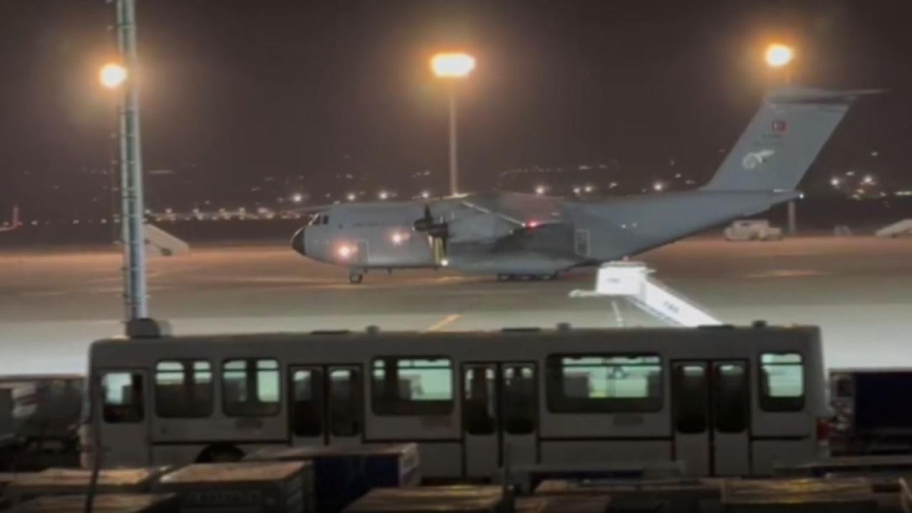 Şehitlerimizin naaşını taşıyan uçak Tiflis'ten havalandı