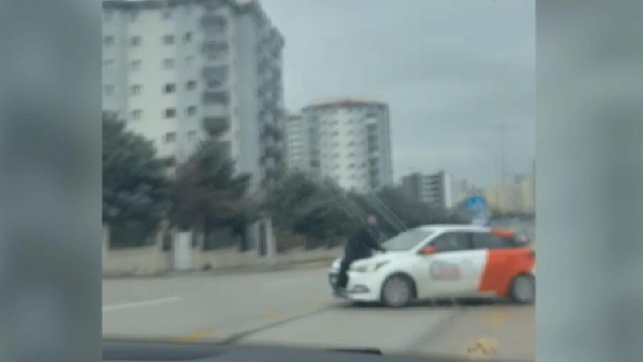 Tartışma sonrası aracın kaputunda metrelerce sürüklendi