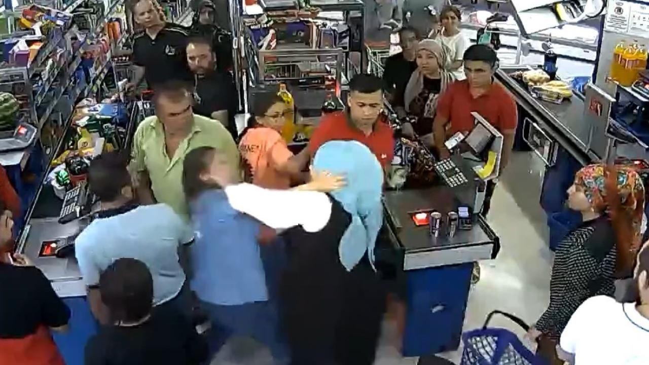 Yeğenlerini markette darp eden dayı ve yenge cezasız kalmadı