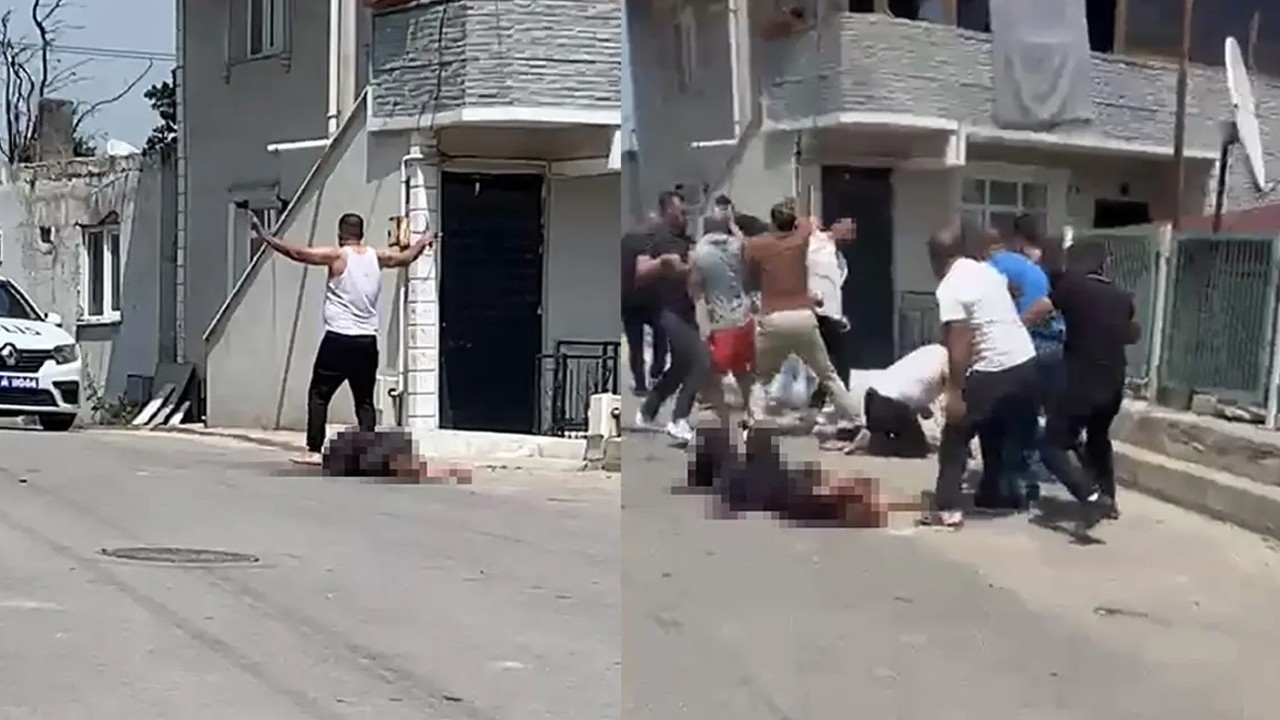 Eşini sokakta katletti, linçten polis kurtardı