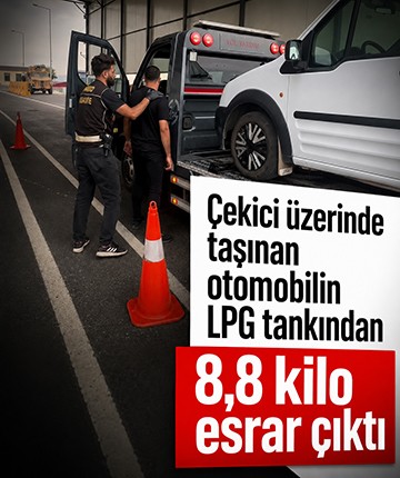 Çekici üzerinde taşınan otomobilin LPG tankından 8,8 kilo esrar çıktı